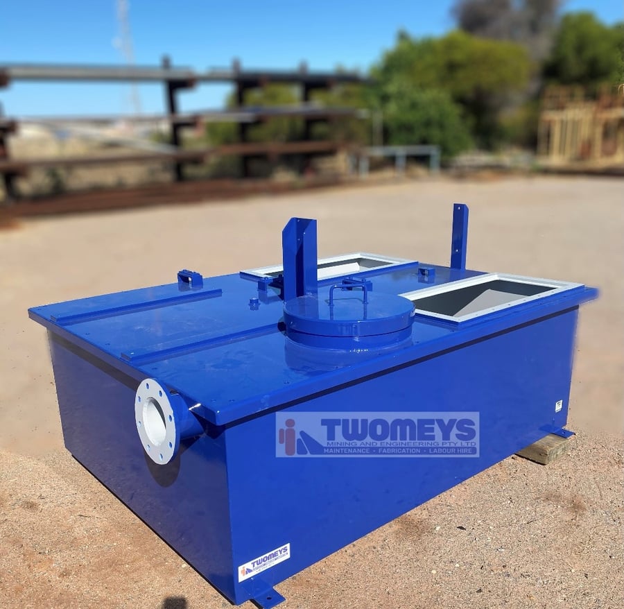 Blue painted fabricated hydraulic tank with flanged outlet, inspection hatches and lifting lugs