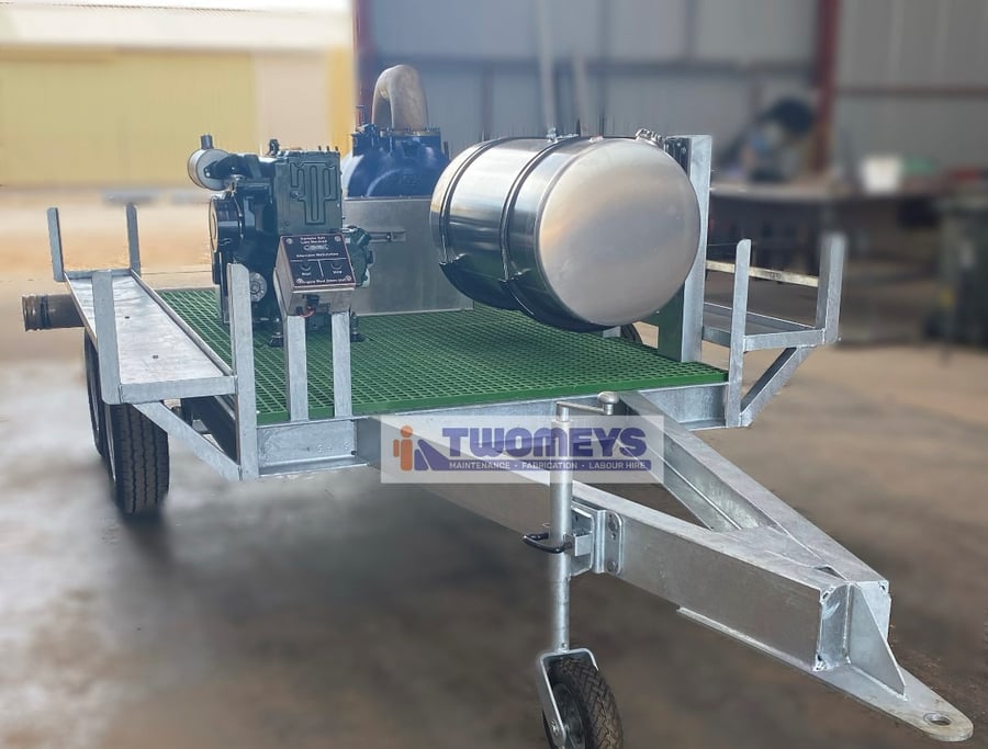 Galvanised single axle pump trailer built at the Twomeys workshop, fitted with a diesel driven pump, stainless tank and green grating deck