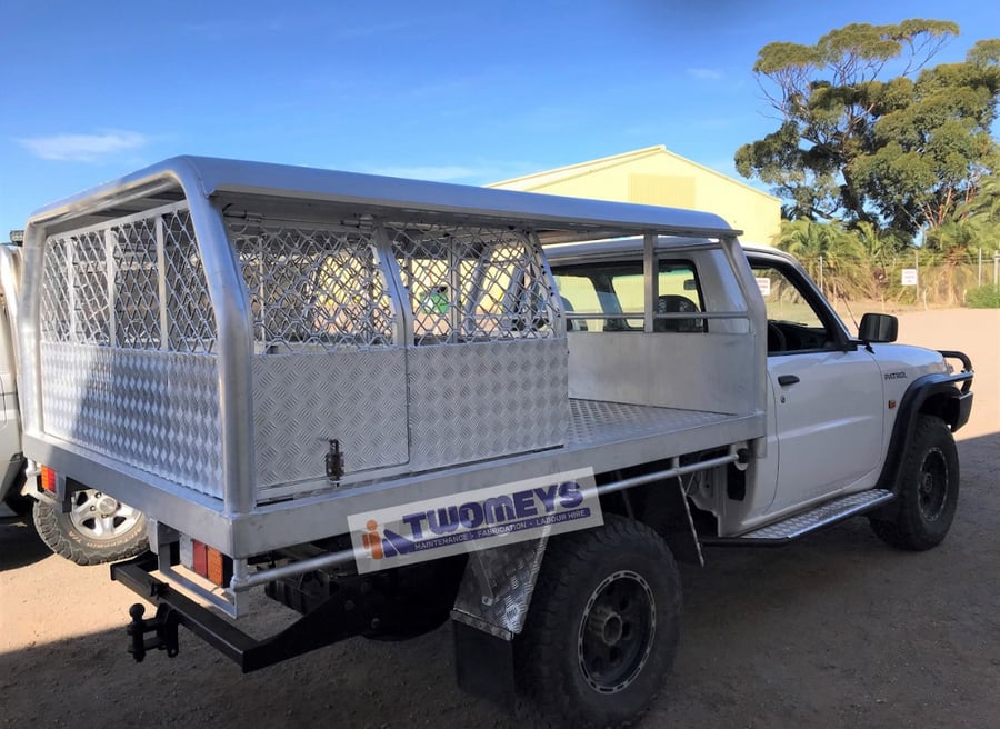 Aluminium mesh canopy with checker plate doors fitted to a single cab utility tray